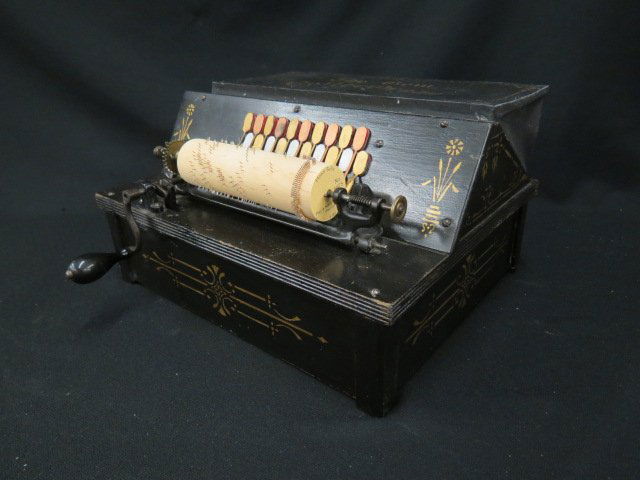 The Gem Roller Organ,: an excellent Victorian example, with a couple extra rollers, working.
