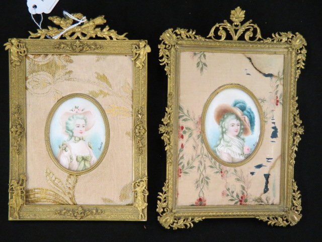 Pair of French Miniature Handpainted Portraits: on Ivory, young ladies in fancy hats, artist signed, each 2" x 2 7/8", in ornate brass frames, circa 1890's.