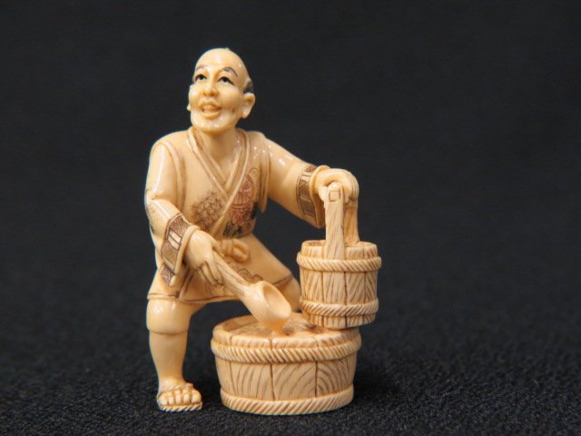 Carved Ivory Netsuke of Man,: with a wooden bucket, tub and dipper, 2" tall, signed, excellent.