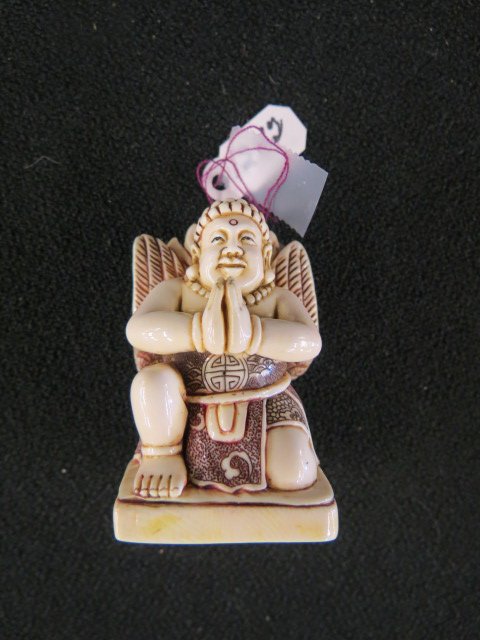 Carved Ivory Netsuke of a Buddist praying Angel,: fancy polychrome, signed, excellent.