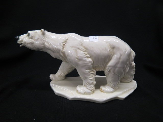 E.N.S. Porcelain Figurine of a Polar Bear,: ivory glaze, 5 1/2" tall, 11" long, excellent.