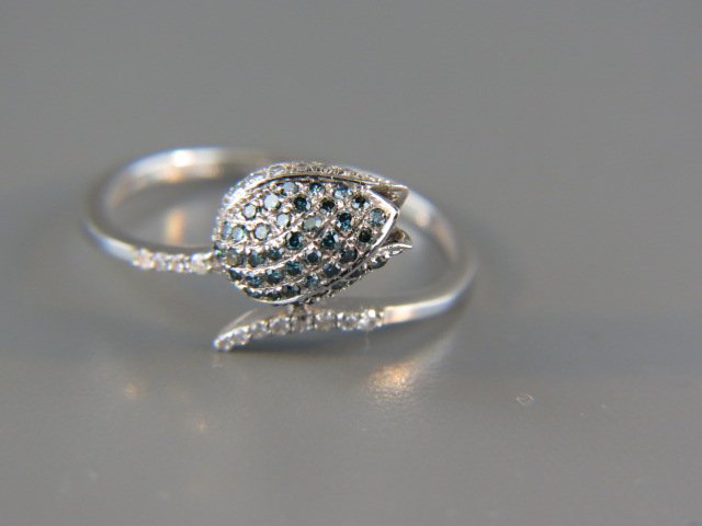 Blue & White Diamond Ring,: floral bud setting, .35 carat total, 14k white gold, currently size 7 3/4.