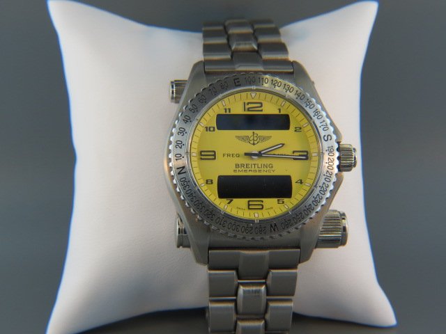 Breitling Man's Wristwatch, Emergency II model,: scarce dual frequency emergency model... Emergency beacons are great insurance for aviators and sailors, but they aren't worth much if a disaster leaves you in one place and the beacon in another. Jus