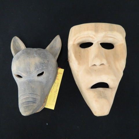 2 Cherokee Indian Masks;: Wolf Clan by Adam Welch, buckeye wood and another by Jonason Little John, largest is 8" x 13".Native American masks had many different purposes including its medicinal and spiritual uses and sometimes