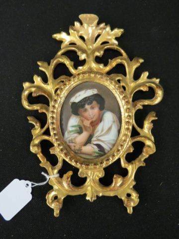 Painting on Porcelain Plaque of Young Boy,: with grapes, oval, 3 1/2" x 2 1/2" image area in carved & gilt Italian frame.