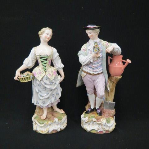 Pair of Meissen Porcelain Figurines of: Man & Woman with flowers, crossed swords mark, approx. 14" tall.