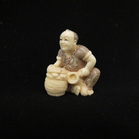 Carved Ivory Netsuke of a Man: with drum, fine polychrome, signed, 2", excellent.