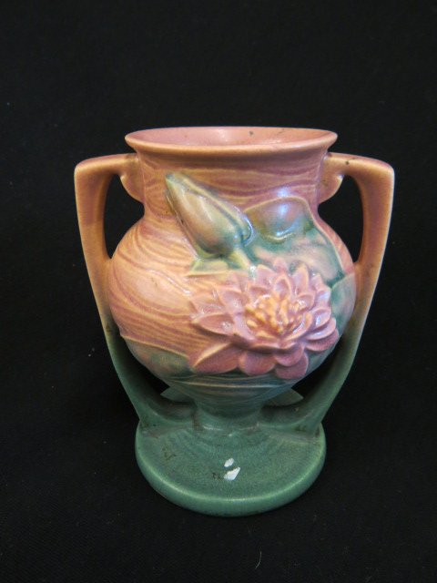 Roseville Water Lily Vase,: pink, handled, #174-6, excellent, 1943."...The Roseville Pottery Company was founded in 1890. Roseville initially produced simple utilitarian ware such as flower pots, stoneware, umbrella stands, cusp