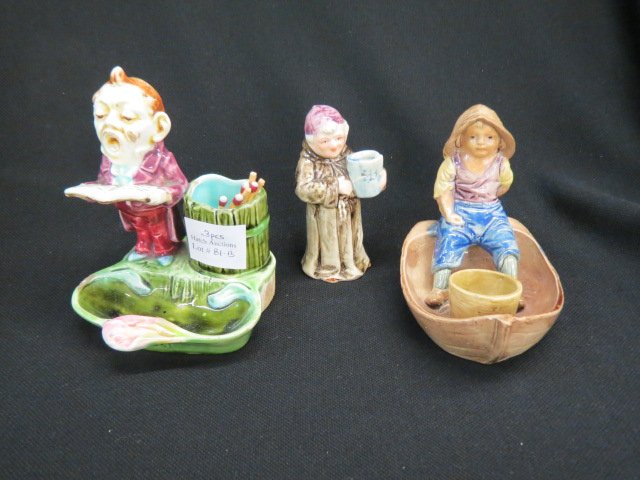 3 pcs. Majolica Pottery with Figures,: boy in boat, monk with stein and musician smoking dish.