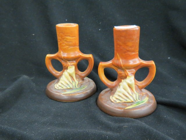 Pair of Roseville Freesia Art Pottery Candlesticks,: brown, 1945, #1161-4 1/2, excellent."...The Roseville Pottery Company was founded in 1890. Roseville initially produced simple utilitarian ware such as flower pots, stoneware, umbrella stands, cuspido