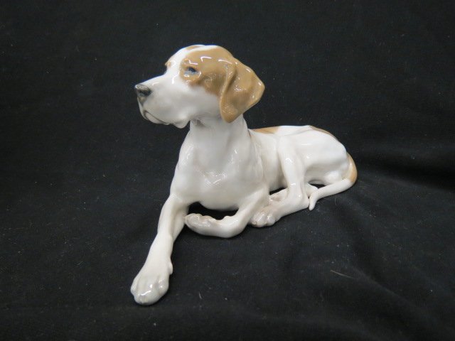 Royal Copenhagen Porcelain Dog Figurine,: laying hound dog, 9 1/2 long, #1453/1653, excellent."