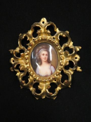 Miniature Painting on Porcelain of Young Lady,: oval image area 2 1/2" x 2", in gilt wooden frame, circa 1890.