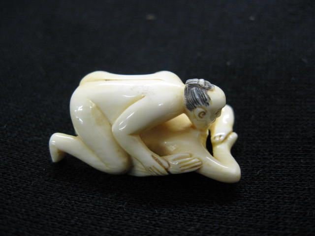 Carved Ivory Erotic Netsuke,: couple in 69 position, 1 3/8", excellent.