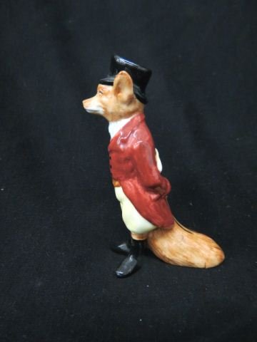 Royal Doulton Figurine of a Fox,: dressed in hunting outfit, 4 3/4", excellent.