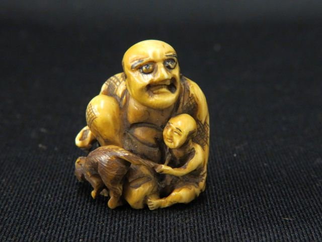 Carved Ivory Netsuke of a Man,: child & dog, 1 1/2", signed, excellent.