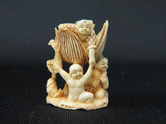 Carved Ivory Netsuke of Three Boys: and a huge water hyacinth, 1 5/8", signed, excellent.