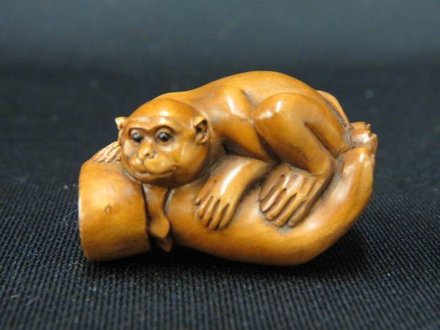 Carved Wood Netsuke of a Monkey,: in buddhas hand, onyx eyes, 1 3/4", signed, excellent.