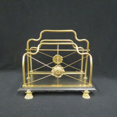 Brass Magazine Rack,: ebony base, lion paw feet, 11 x 14"."