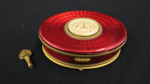Antique Mechanical Bird Music Box,: enameled with carved ivory oval medallion gilt bronze, 3 1/4 x 5", working."