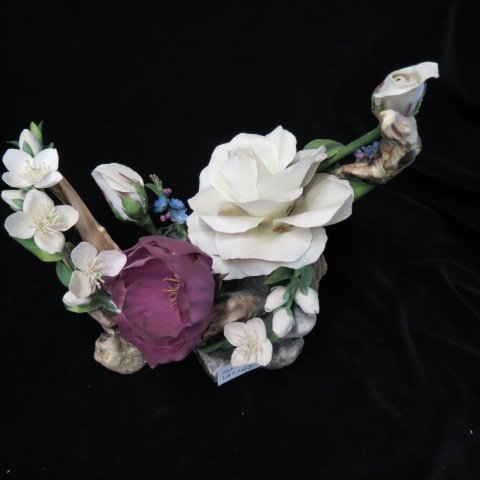 Boehm Porcelain The Lady Diana Rose": Centerpiece, #41, 12" wide, 8 1/2" tall, some loss... E. M. Boehm, now Boehm Porcelain, is the artisan studio founded by sculptor Edward and wife Helen Boehm in 1950. It is today recognized as one of 