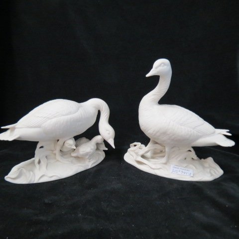 Boehm Porcelain Pair of Figurines,: Canadian Geese, early white finish, male & female, tallest, 7, excellent... E. M. Boehm, now Boehm Porcelain, is the artisan studio founded by sculptor Edward and wife Helen Boehm in 1950. It is today