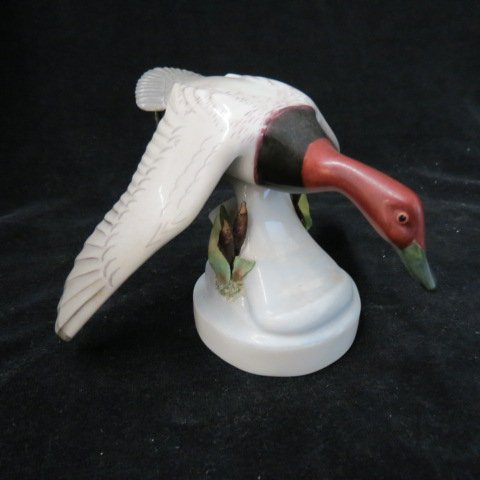 Boehm Porcelain Figurine of a Goose in Flight,: cattails on base, early mark, 4, excellent... E. M. Boehm, now Boehm Porcelain, is the artisan studio founded by sculptor Edward and wife Helen Boehm in 1950. It is today recognized as one of the worl