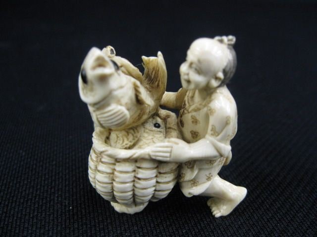 Carved Ivory Netsuke of Man,: with large basket, two fish and a turtle, signed, 1 1/2, excellent."