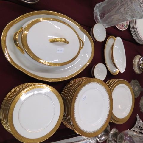 33 pcs. Limoges Porcelain Dinnerware,: plates & servers, plus two cups, coronet.