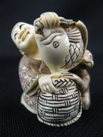 Carved Ivory Netsuke of Seated Man: with basket, monkey and a large fish, signed, 1 1/2, excellent."