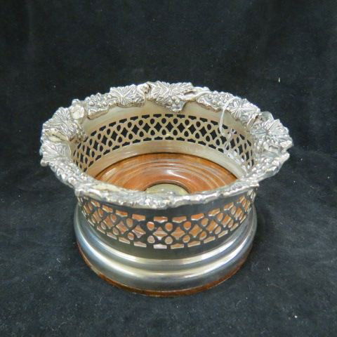 Silverplate Wine Coaster,: grape & vine design on basketweave, 6 diameter."