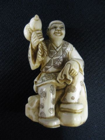 Carved Ivory Netsuke of a Seated Man: gourd on shoulder, signed, 2, excellent."