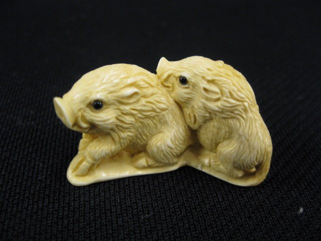 CArved Ivory Netsuke of Two Wild Boars,: onyx eyes, signed, 2, excellent."