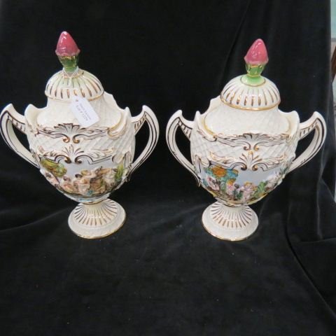 Pair of Capodimonte Urns,: children at play, 14 1/2 tall, excellent."