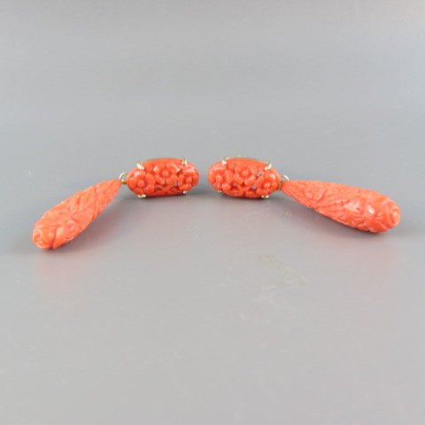 Carved Coral & 14k Gold Earrings,: teardrop dangles with oval florals above, yellow gold, 2" long.