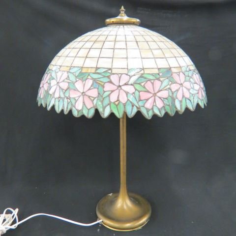 Leaded Glass Lamp by Unique Art Glass & Metal Company.: fine floral 22 1/2" diameter shade, bronzed base, four sockets, 30" tall, similar to a Handel, see Mosaic Shades book by Paul Crist, page 74 & 75.
