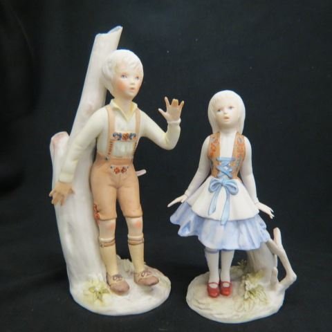 2 Cybis Porcelain Figurines "Hanzel & Gretel",7" .: 2 Cybis Porcelain Figurines "Hanzel & Gretel",7" .Cybis®, recognized by collectors and connoisseurs throughout the world for its unsurpassed beauty, offers today's collector a timeless symbol of eleg