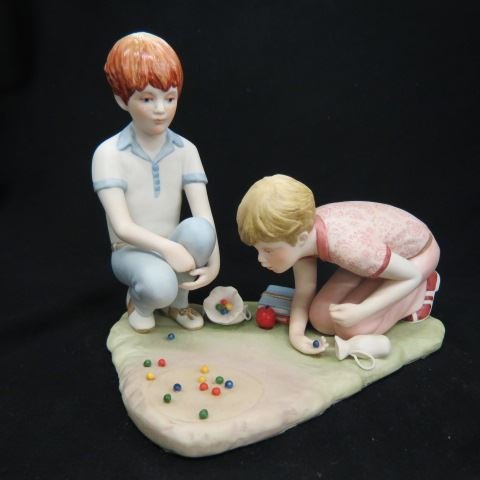 Cybis Porcelain Figurine of Boys Shooting: marbles, 8" x 6 1/2", excellent.Cybis®, recognized by collectors and connoisseurs throughout the world for its unsurpassed beauty, offers today's collector a timeless symbol of elegance and taste. Ea