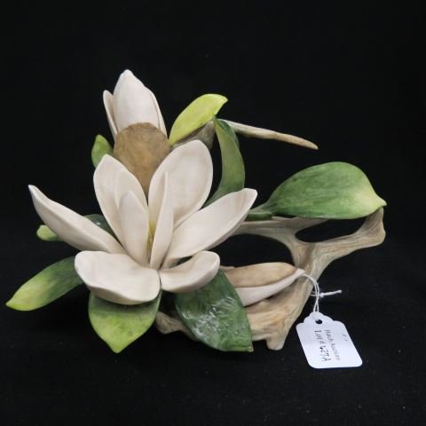 Cybis Porcelain Figurine "Magnolia",: #504, 7 1/2" x 5".Cybis®, recognized by collectors and connoisseurs throughout the world for its unsurpassed beauty, offers today's collector a timeless symbol of elegance and taste. Each Cybis work