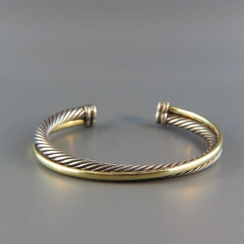 David Yurman 18k Gold & Sterling Bracelet,: twisted rope & cable design, cuff style, signed, 37 grams.