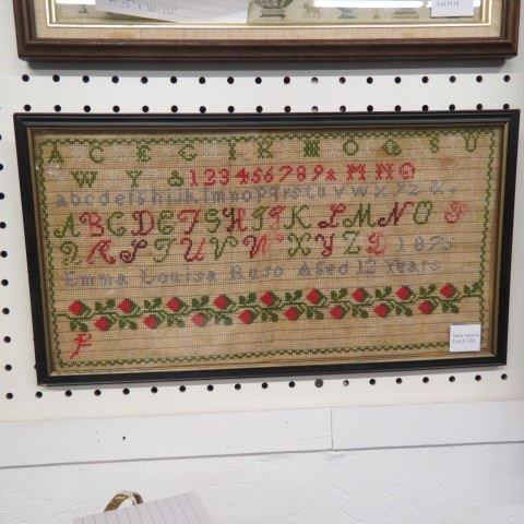 1875 Sampler, Emma Louisa Ruso,: 12 years old, alphabet, numbers & flowering vine, 16" x 8".