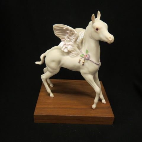 Cybis Porcelain Figurine of a Winged Horse,: 9" tall plus wood base. recognized by collectors and connoisseurs throughout the world for its unsurpassed beauty, offers today's collector a timeless symbol of elegance and taste. Each Cybis work of