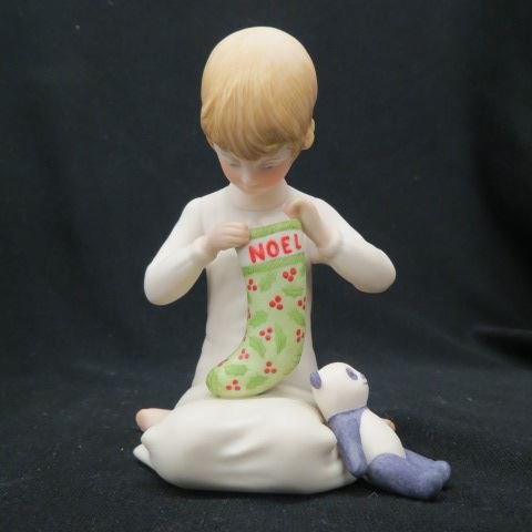 Cybis Porcelain Figurine of Child with Christmas: Stocking, 5 1/2", excellent. recognized by collectors and connoisseurs throughout the world for its unsurpassed beauty, offers today's collector a timeless symbol of elegance and taste. Each Cybis wor