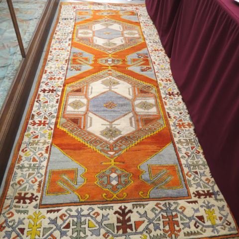 Semi-Antique Karapinar Turkish Handmade: Runner, two large geometric medallions, soft earthtones, central region, 3'11" x 10'4".