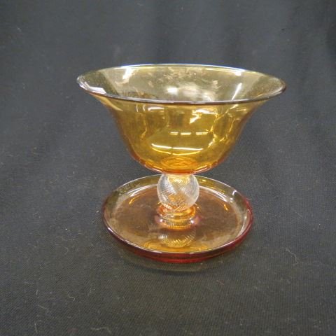 Steuben Art Glass Compote,: golden topaz with clear swirl ball pedestal, 5 1/2", excellent...Steuben Glass Works was an American art glass manufacturer, founded in the summer of 1903 by Fredrick C. Carder and Thomas G. Hawkes in