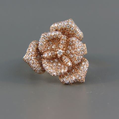Diamond Ring,: 242 round diamonds totaling 2 carats in 14k rose color gold, high grade, with appraisal of $5,350.00, currently size 8.