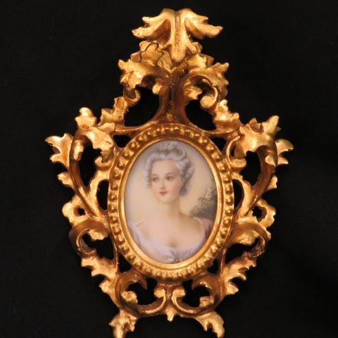 Miniature Painting on Ivory of Young Lady,: in ornate carved & gilt Italian frame, image area 3 1/4" x 2 1/2".