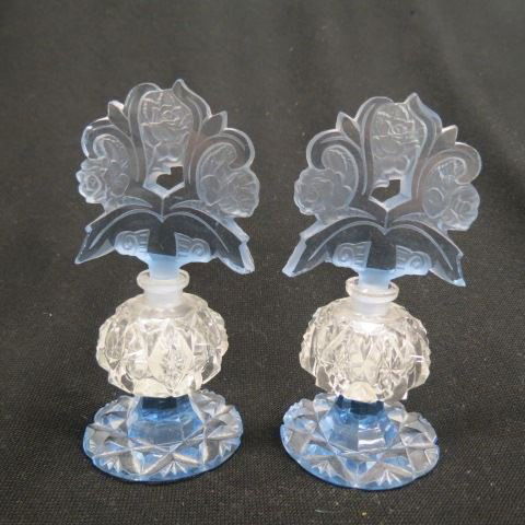 Pair of Czechoslovakia Art Glass Perfume Bottles,: cut crystal with intaglio flower, blue base & stopper (stoppers have chips), 6" tall.
