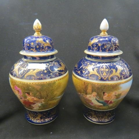 Pair of Royal Vienna Beehive Porcelain Vases,: handpainted scenes of maidens & cherubs, "Young Bacchus" & " A Little Captive", scenes, cobalt & gold trim, one chipped.