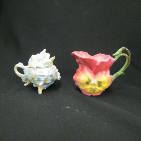 2 pcs. Royal Bayreuth Figural Porcelain,: shell mustard pot and floral creamer...Royal Bayreuth is the name of a factory that was founded in Tettau, Bavaria, in 1794. It has continued to modern times. The marks have changed through the years.