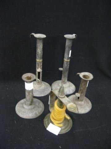 5 pcs. Early Tin Lighting;: taper candle chamber stick and two pair of push-up candlesticks, 5 1/2" & 9 1/2".